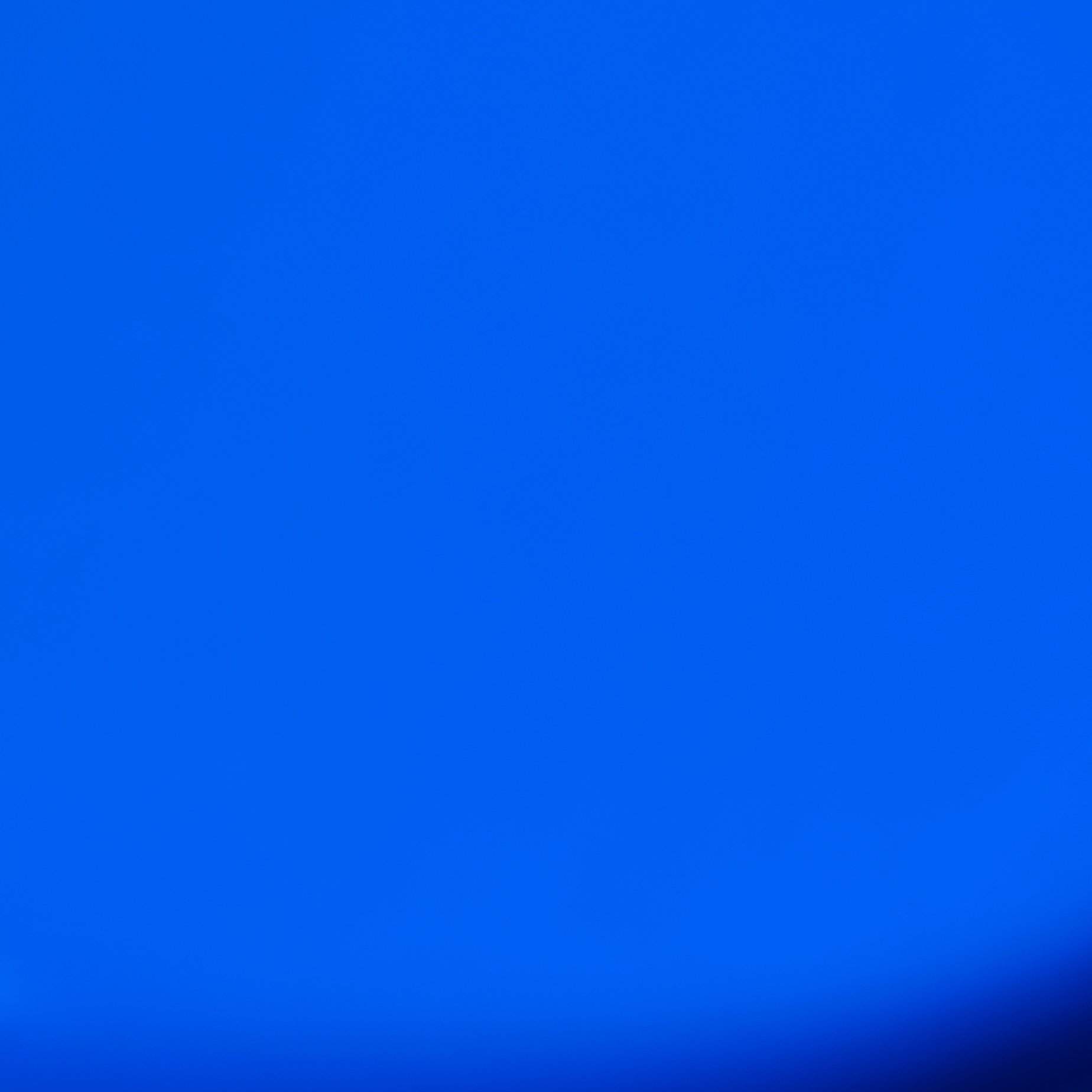 A Button Looking Like A Bottle Cap But Top Surface Painted Solid Blue With No Logo - Full Resolution Quality Preview