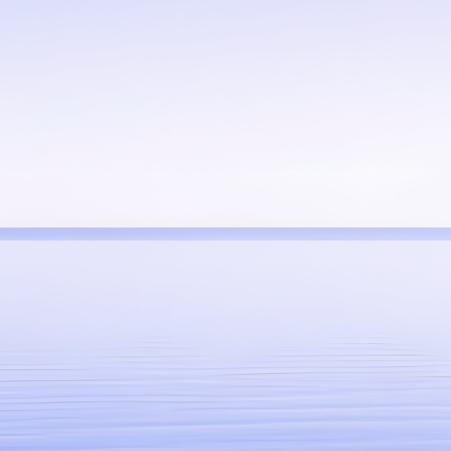 A Calm Body Of Water Under A Clear Sky Water Horizon - Full Resolution Quality Preview