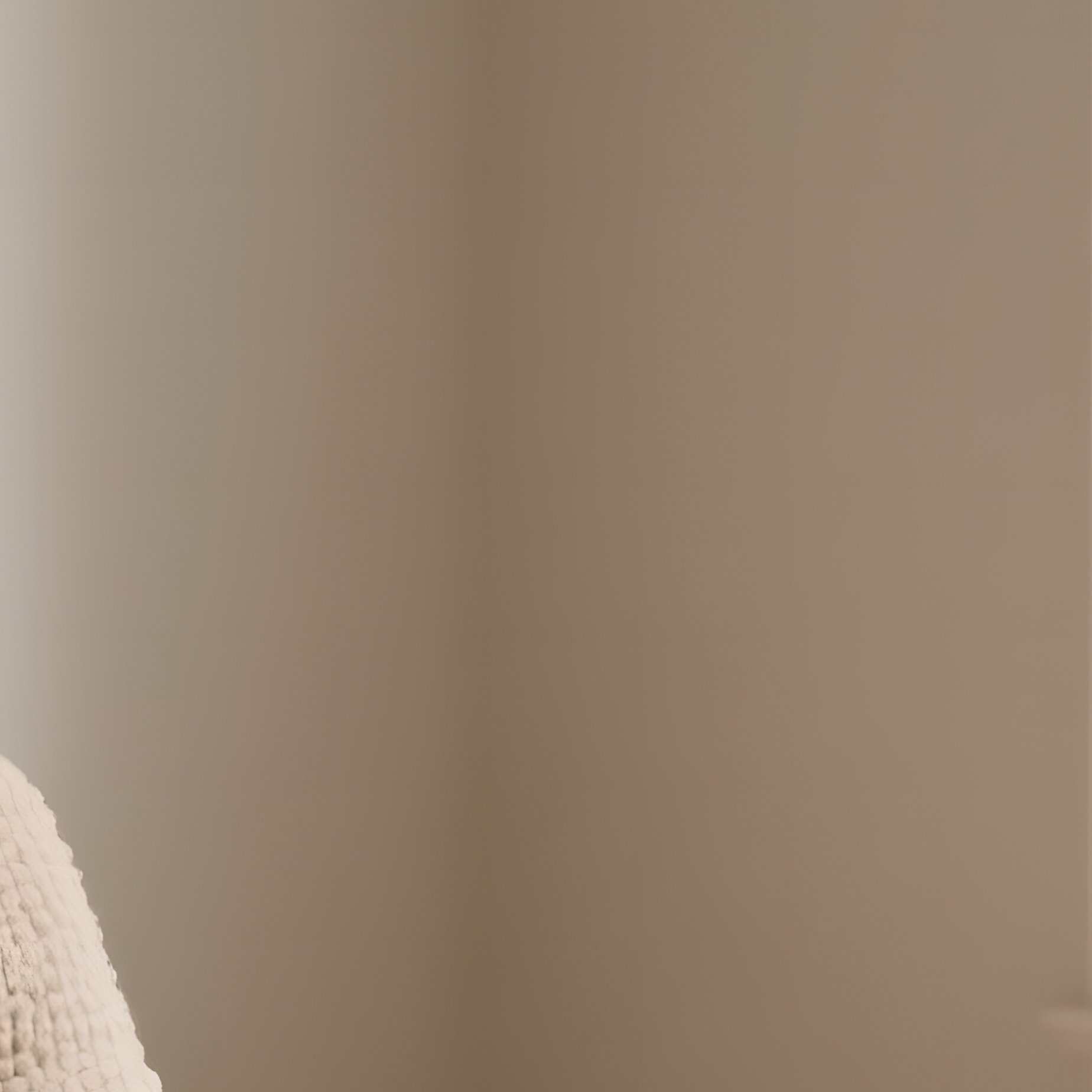 A Cozy Reading Nook Featuring A Custom Made Lounge Chair In Boucle Fabric, A Slim Brass Floor Lamp, And A Small Round Side Table Beside A Large Window - Full Resolution Quality Preview