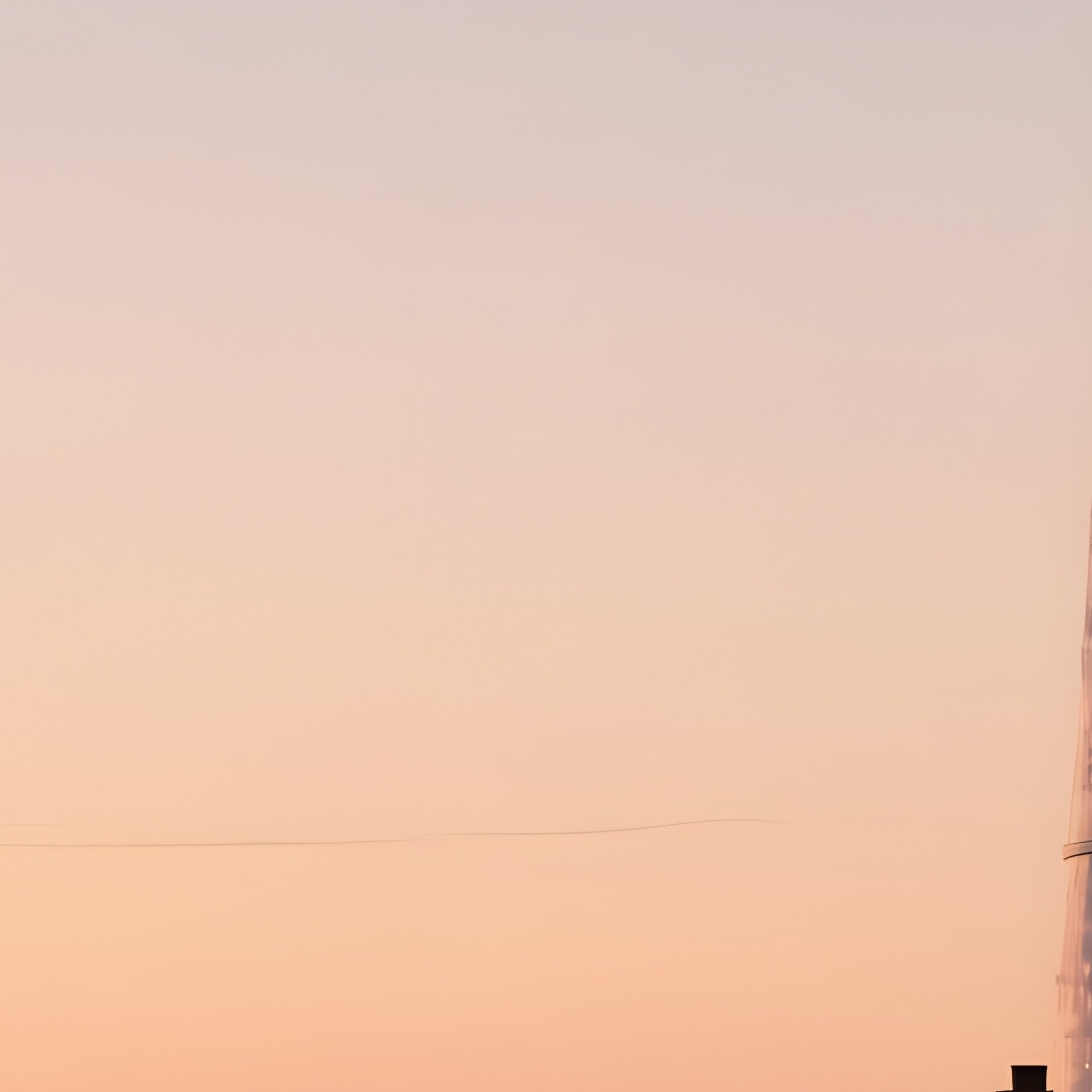 A Cutter Passing An Offshore Lighthouse At Dusk - Full Resolution Quality Preview