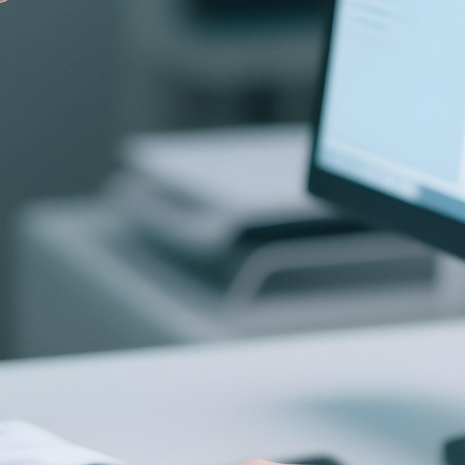A Doctor Typing Notes Into An Electronic Medical Record System - Full Resolution Quality Preview