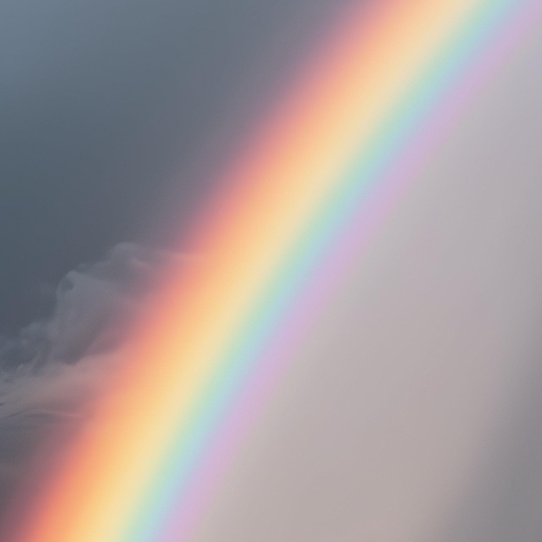 A Dramatic Rainbow Cutting Through A Stormy Sky - Full Resolution Quality Preview