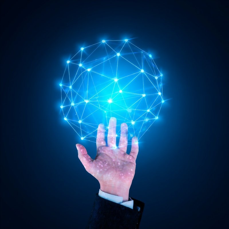 A Hand Interacting With A Digital Network Structure Technology