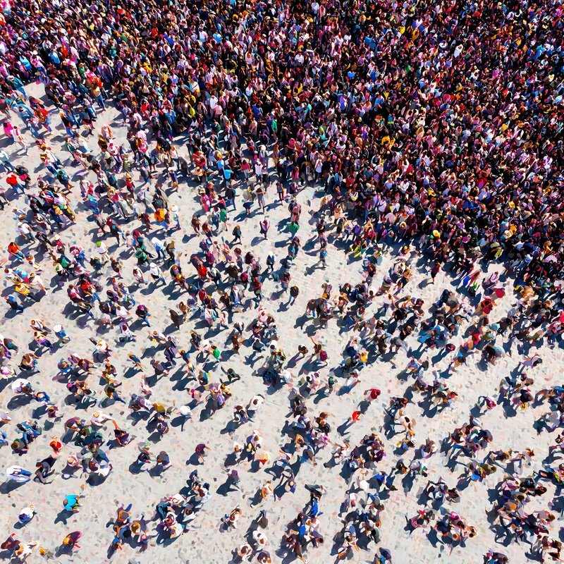 A Large Crowd Of People From An Aerial View Crowd Aerial View