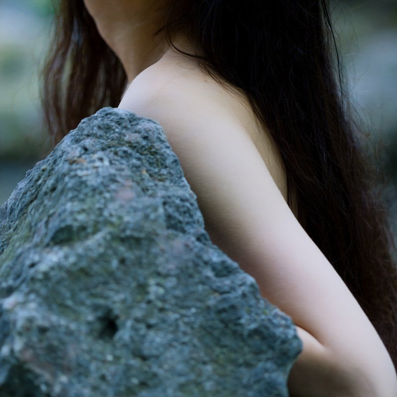 A Person Partially Obscured By A Rock Nature Outdoor