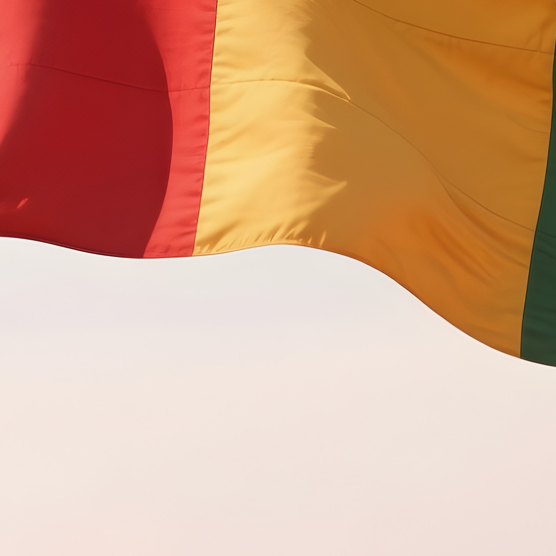 A Photorealistic Guinean Flag Waving Above A Dusty Red Earth Landscape. - Full Resolution Quality Preview