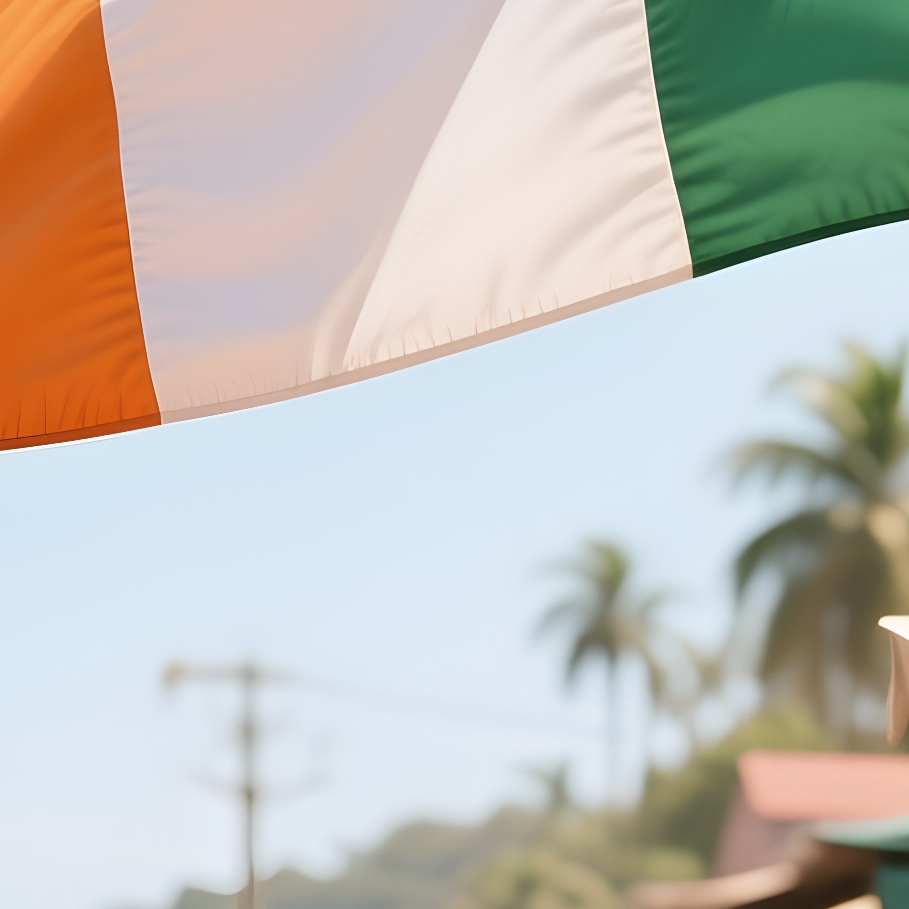 A Photorealistic Ivorian Flag Fluttering Beside A Warm Coastal Market Street. - Full Resolution Quality Preview