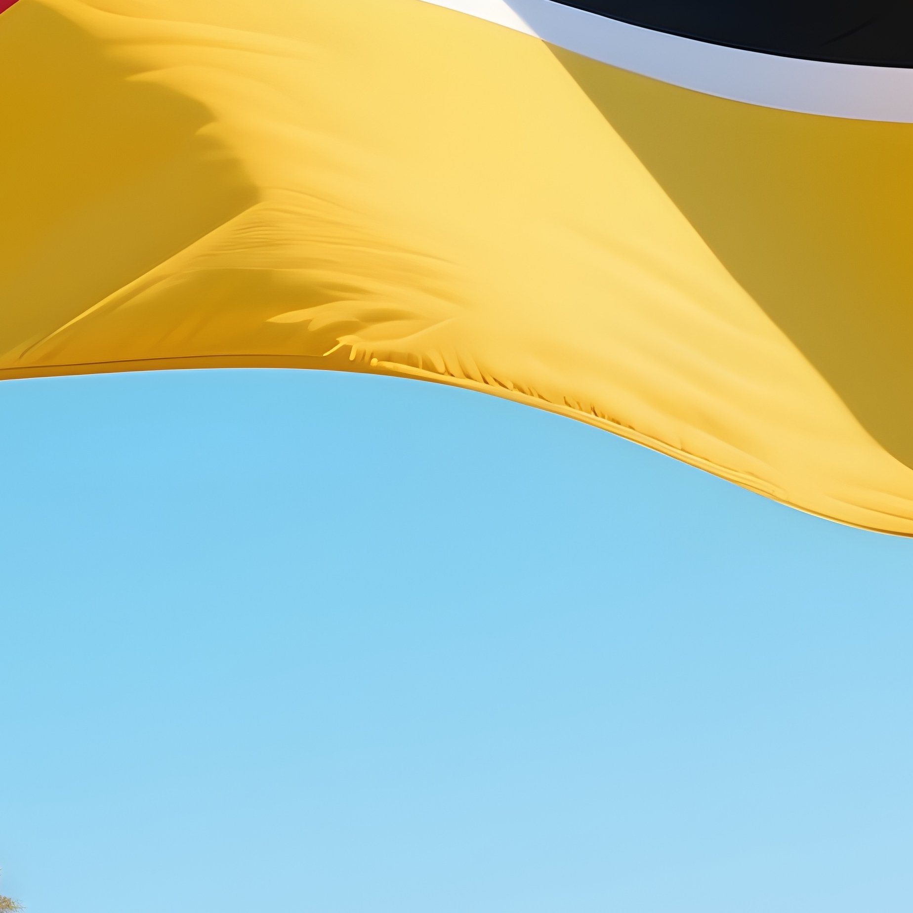 A Photorealistic Mozambican Flag Fluttering Near A Bright Coastal Village. - Full Resolution Quality Preview