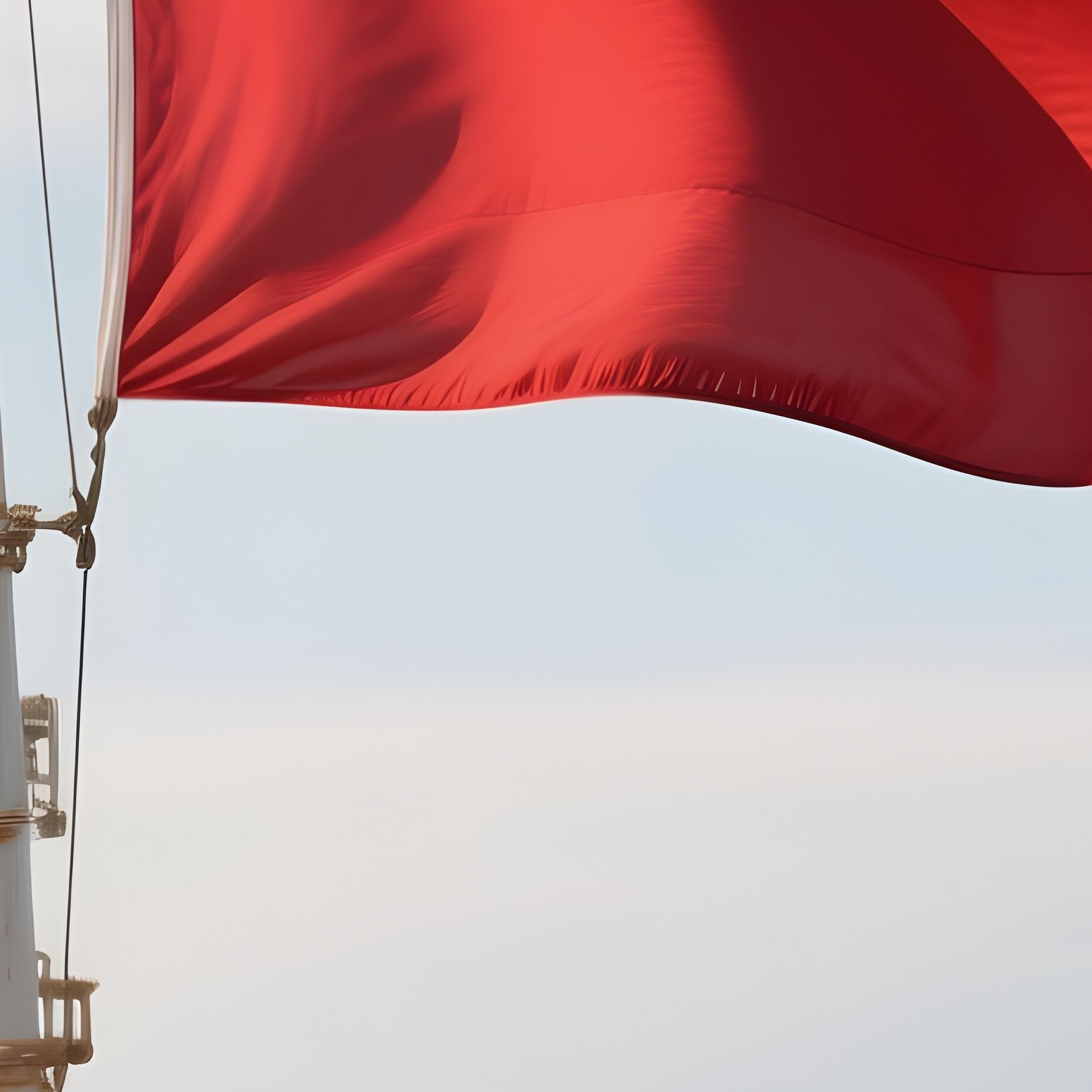 A Photorealistic Red Ensign Flag Snapping Sharply In Coastal Winds On The Stern Of A Cargo Ship. - Full Resolution Quality Preview