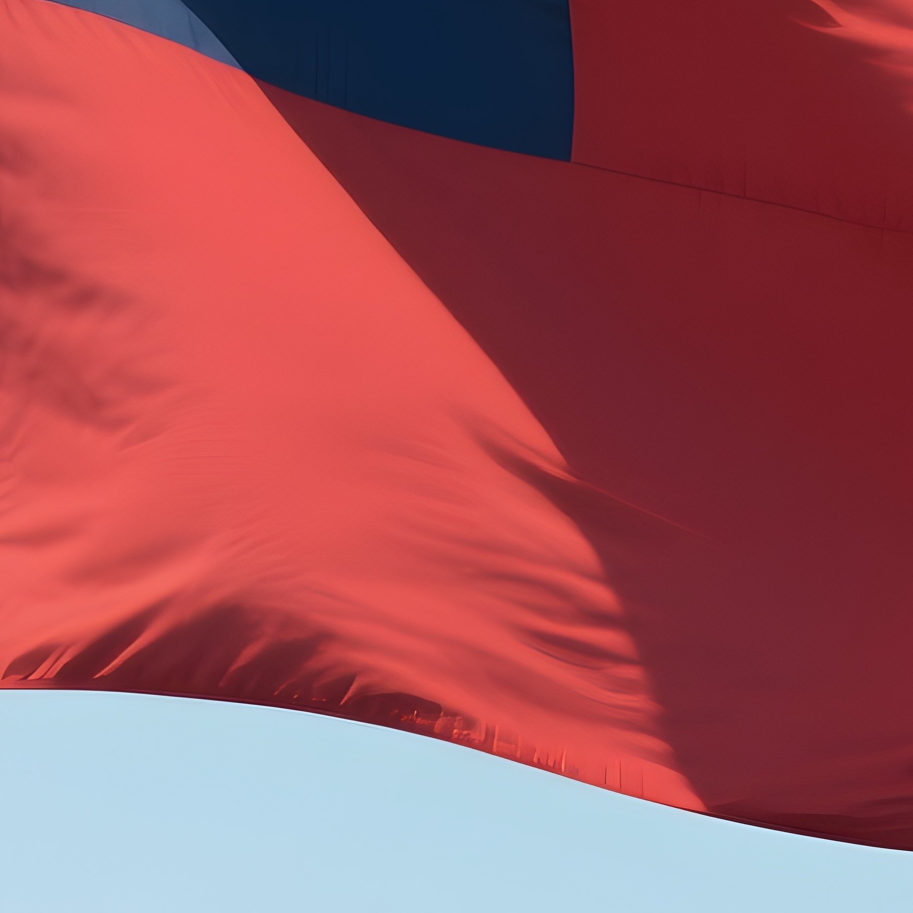 A Photorealistic Samoan Flag Fluttering Above A Quiet Island Village. - Full Resolution Quality Preview