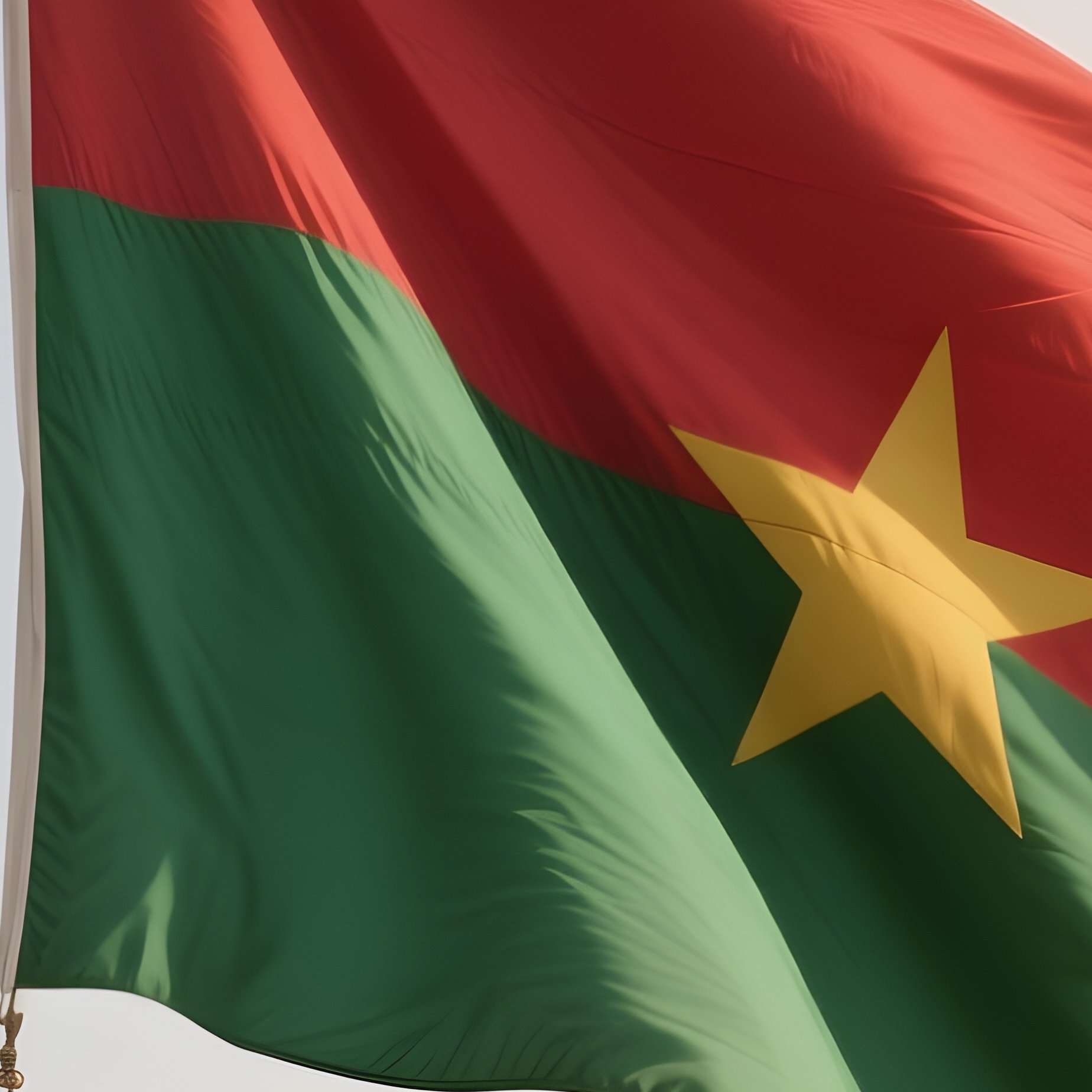 A Photorealistic Scene Of The National Flag Of Burkina Faso Flying At Half Mast On A Tall Flagpole, Gently Lowering In The Wind Against A Respectful, Calm Backdrop With Soft Natural Lighting. - Full Resolution Quality Preview