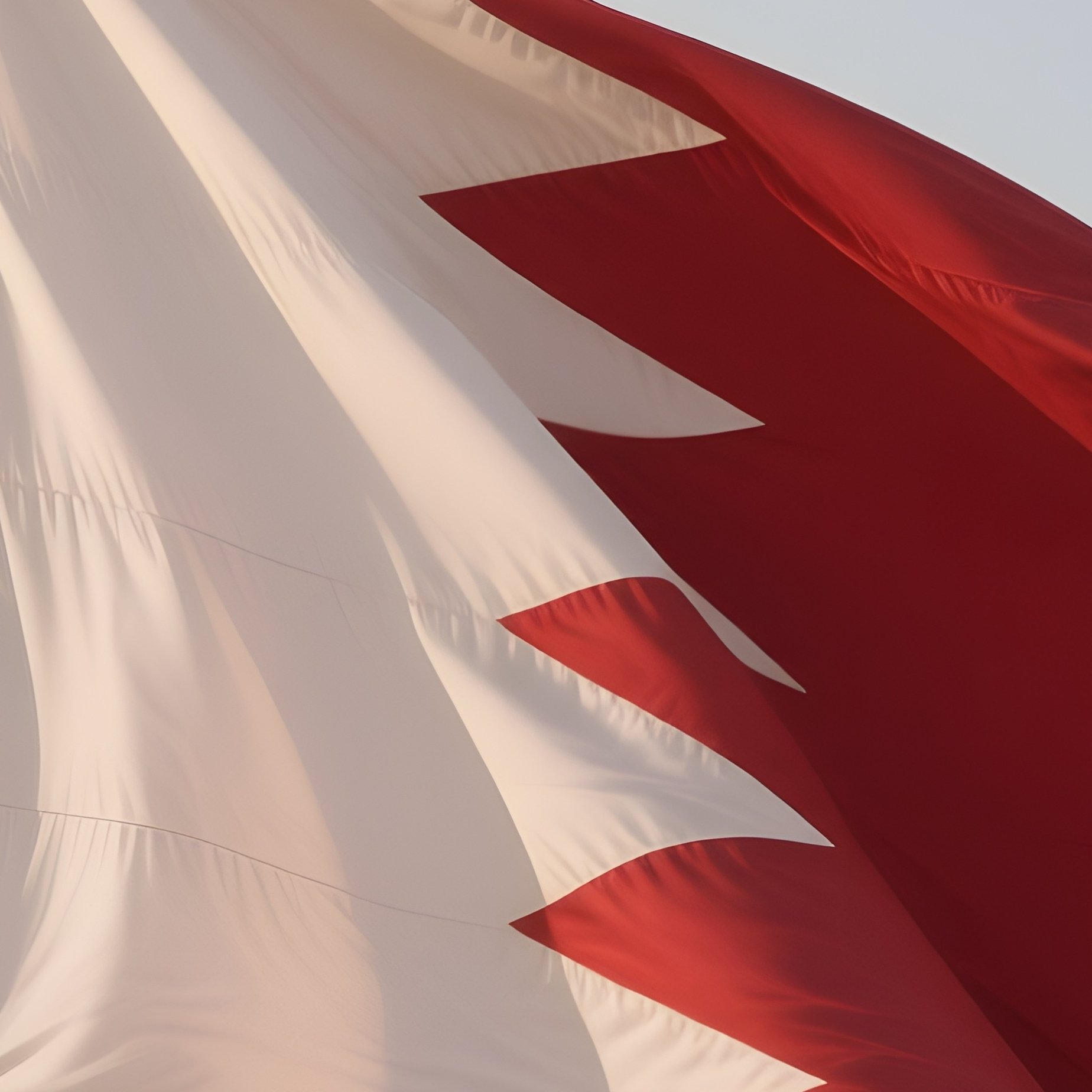 A Photorealistic Scene Of The National Flag Of Bahrain Flying At Half Mast On A Tall Flagpole, Gently Lowering In The Wind Against A Respectful, Calm Backdrop With Soft Natural Lighting. - Full Resolution Quality Preview