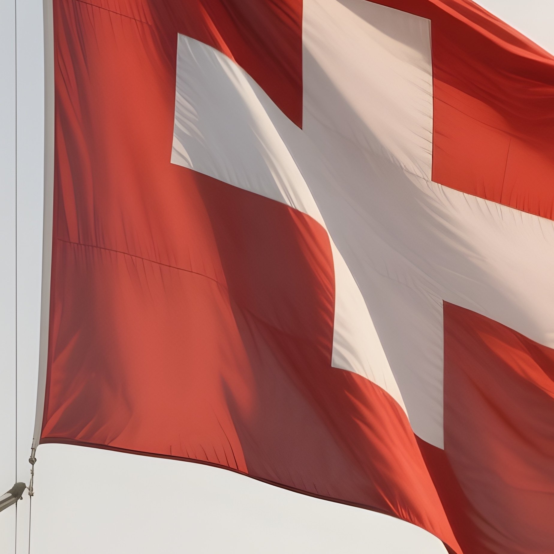 A Photorealistic Scene Of The National Flag Of Switzerland Flying At Half Mast On A Tall Flagpole, Gently Lowering In The Wind Against A Respectful, Calm Backdrop With Soft Natural Lighting. - Full Resolution Quality Preview