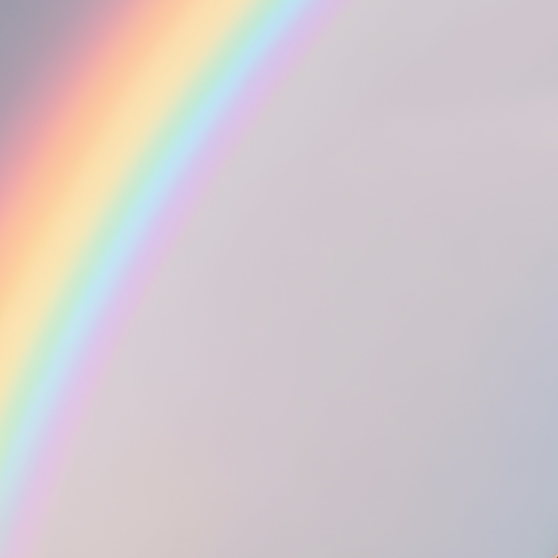 A Rainbow Glowing Behind Jagged Desert Mesas - Full Resolution Quality Preview