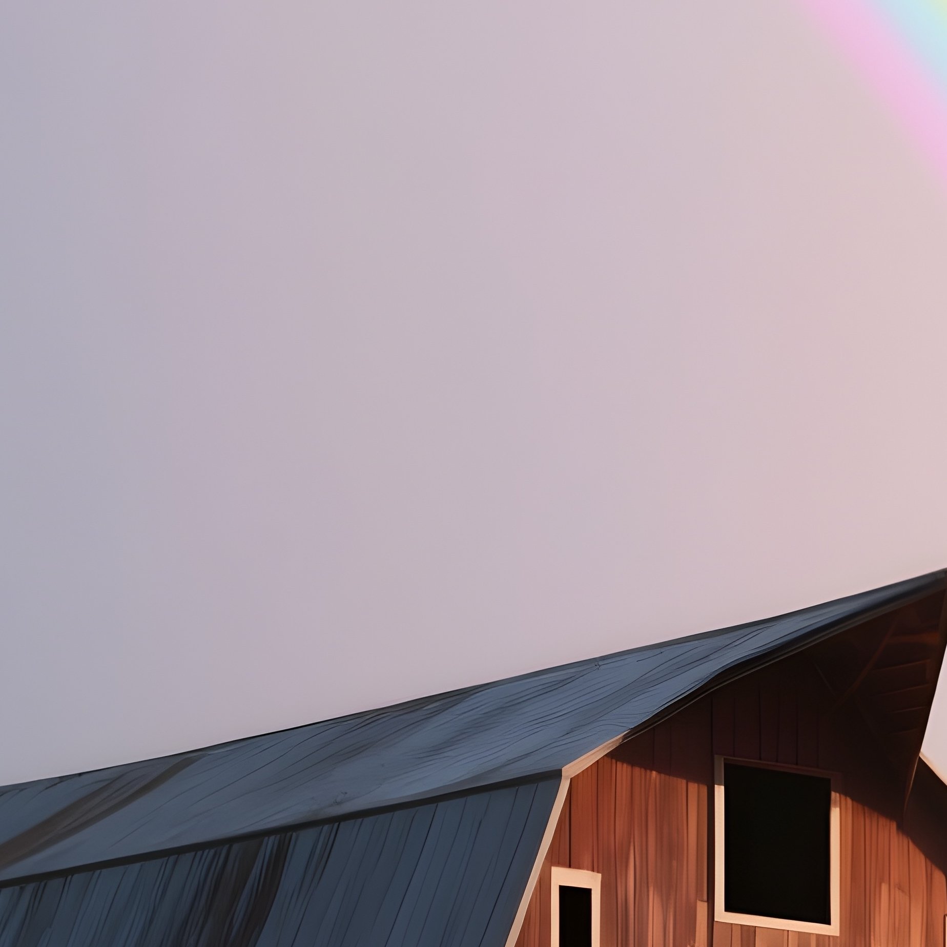A Rainbow Glowing Over A Quiet Rural Barn - Full Resolution Quality Preview