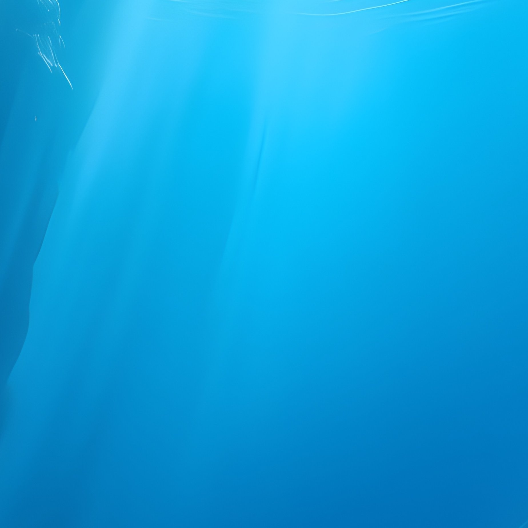 A Rare Blue Hole Underwater Cavern Glowing From Sunlight Above. - Full Resolution Quality Preview