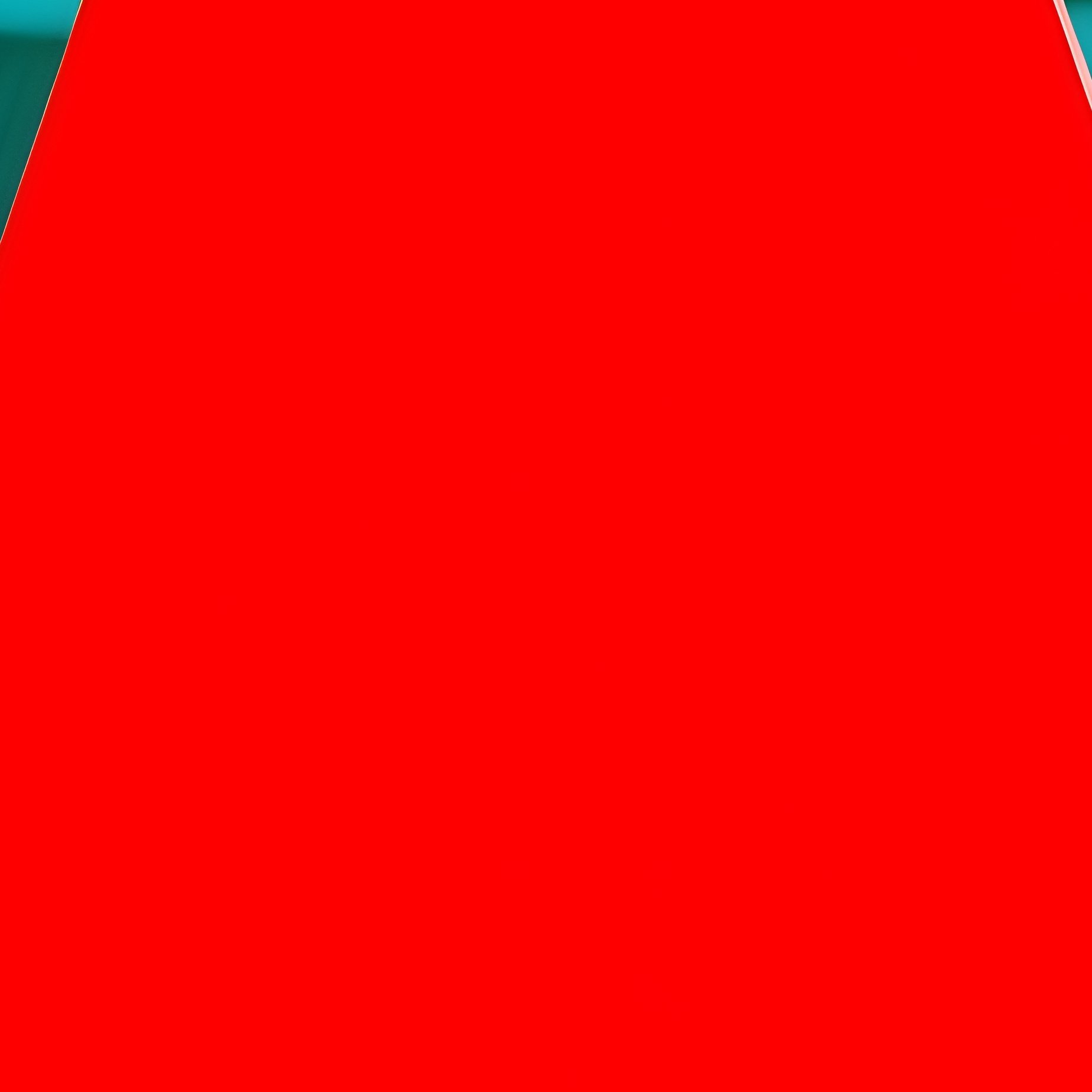 A Red Geometric Shape Overlaying A Blurred Background Abstract Red - Full Resolution Quality Preview