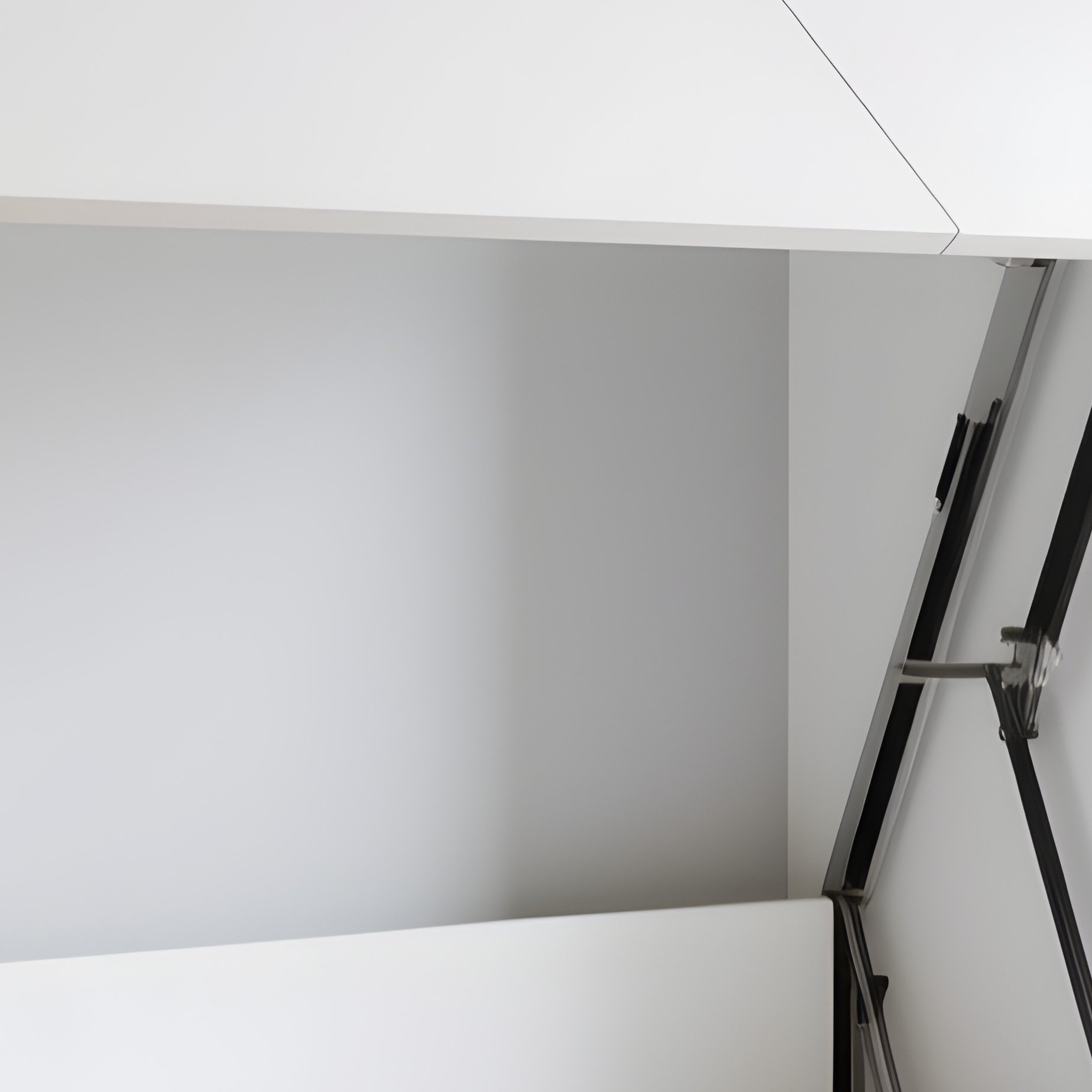 A Space Saving White Murphy Bed Unfolded In A Small Studio Apartment, Demonstrating A Functional And Stylish Layout With Smart Storage Solutions Nearby. - Full Resolution Quality Preview
