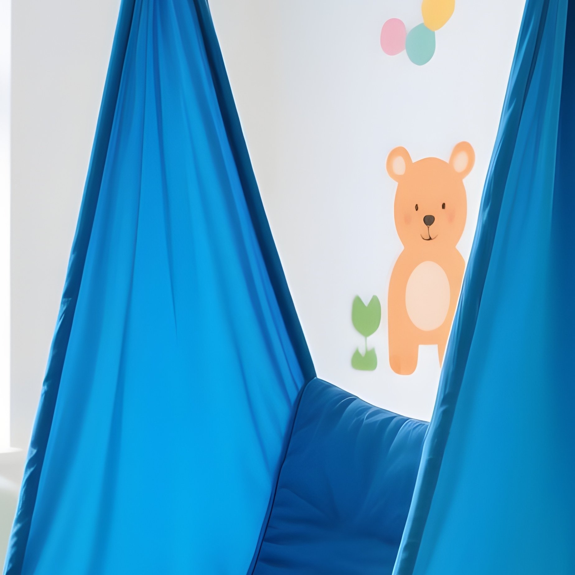 Blue Therapeutic Sensory Swing In Playroom - Full Resolution Quality Preview