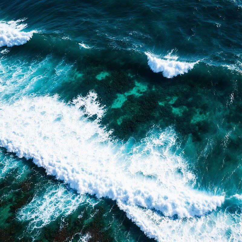 Ocean Waves Crashing Against A Dark Surface Ocean Waves